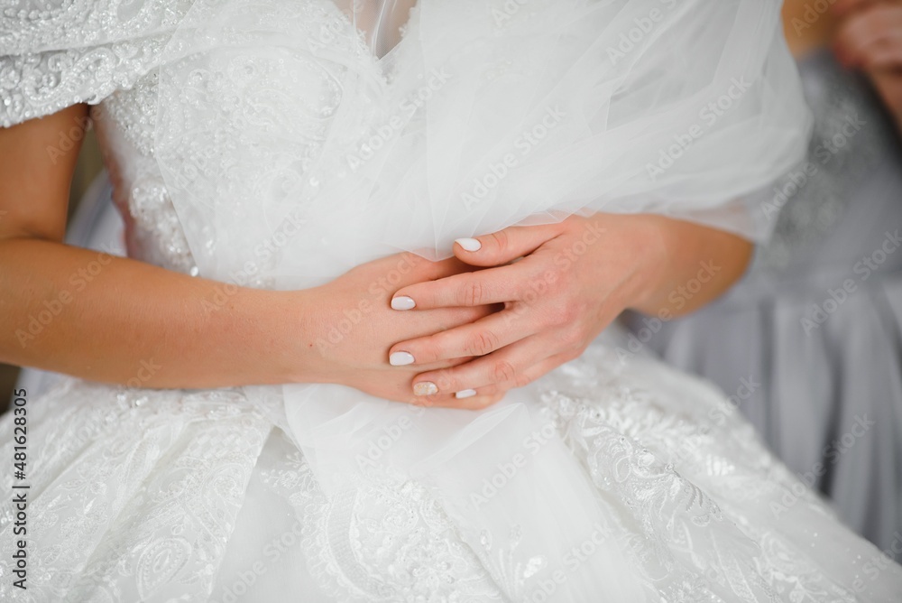 Bride dressing wedding gown. morning bride Bride dressing wedding gown. morning bride
