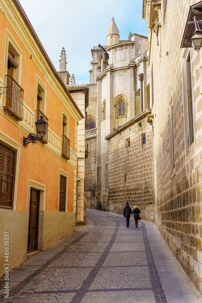Picturesque alley next to the cathedral of Toledo and old stone houses. Toledo Spain