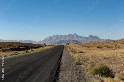 highway in the desert in Iran with suneshine