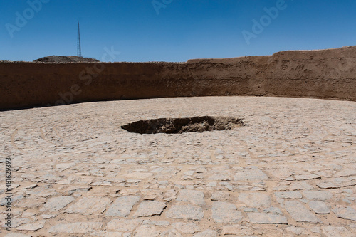 Historical Zoroastrian Silence Tower as a burial place in Yazd, Iran photo