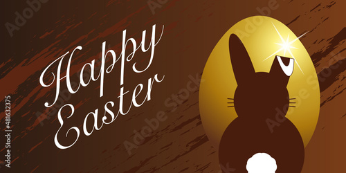 Bannière ou affiche pour Pâques avec une silhouette de lapin regardant un œufs 3D  en or, sur un fond couleur chocolat - texte anglais.