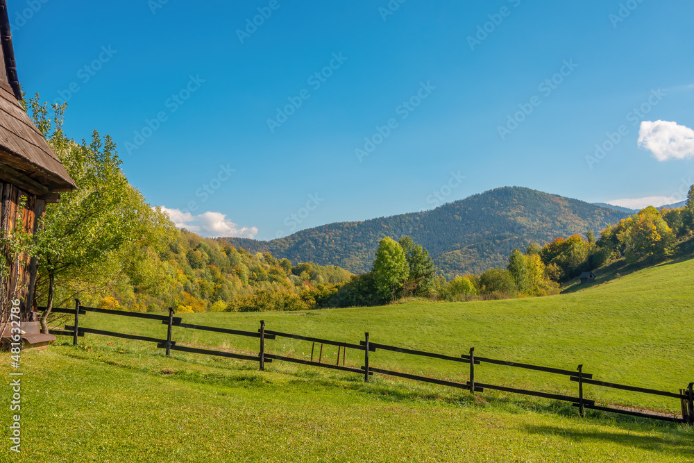 Early autumn in the Carpathian Mountains. Surroundings of the village of Vlkolinec. Rural landscape from Slovakia. Pasture fence on a sunny day.
