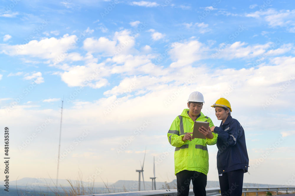 people engineer are wearing a protective helmet on head, using tablet Analytics engineering data... people engineer are wearing a protective helmet on head, using tablet Analytics engineering data...