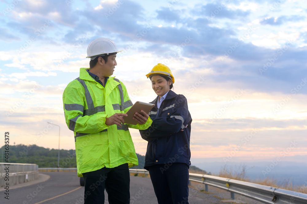 people engineer are wearing a protective helmet on head, using tablet Analytics engineering data... people engineer are wearing a protective helmet on head, using tablet Analytics engineering data...