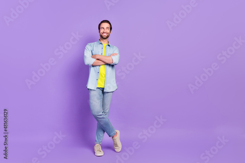 Full size photo of young cheerful male look copyspace dreaming folded hands businessman isolated on violet color background