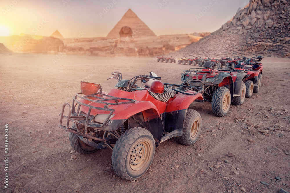 Quad bikes ATV safari in desert background Pyramids Sphinx Cairo, Egypt Quad bikes ATV safari in desert background Pyramids Sphinx Cairo, Egypt