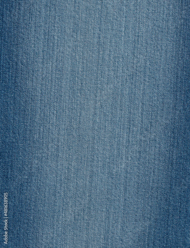 Denim texture in close up view with copy space for vintage background or wallpaper. Blue jeans pattern no seam with macro style to preset about classic fashion cloths concept.