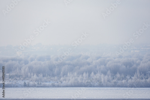 Winter beautiful landscape with trees covered with hoarfrost.  Winter landscape © thayra83