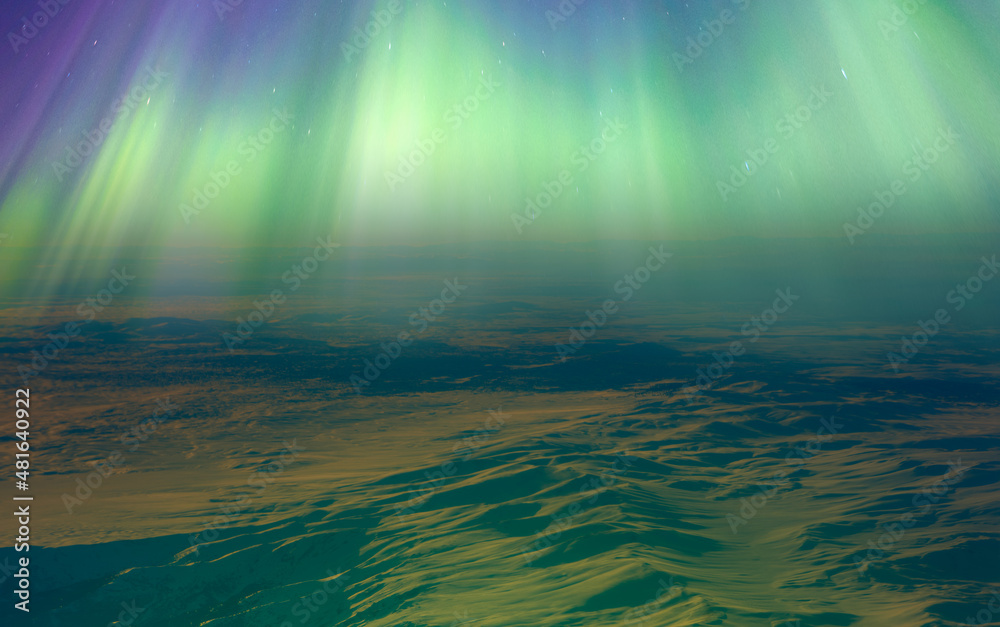 Aurora borealis (Northern lights) over mountain