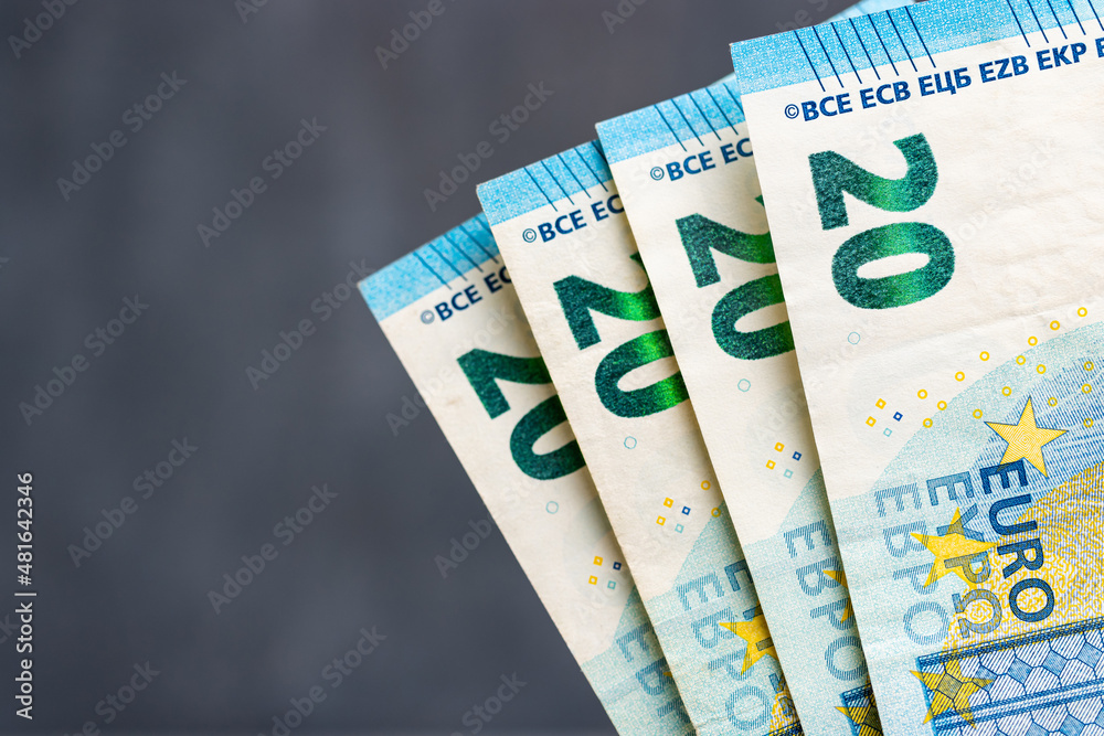 Twenty euro banknotes on dark background, european currency, copy space Twenty euro banknotes on dark background, european currency, copy space