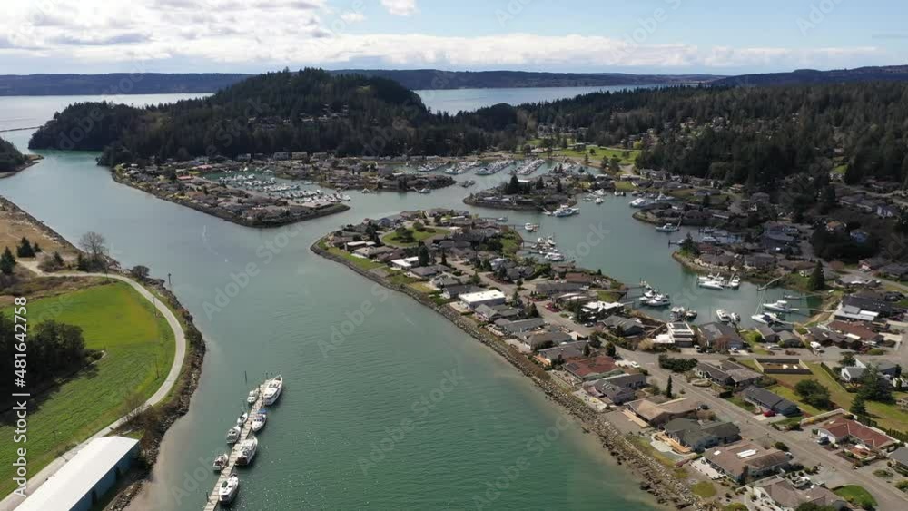 Pan shot of Shelter Bay, Swinomish Village, Swinomish Channel and La Conner on a native American indian tribal reservation in Washington Pan shot of Shelter Bay, Swinomish Village, Swinomish Channel and La Conner on a native American indian tribal reservation in Washington