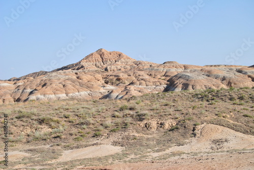 Charyn Canyon in Kazakhstan. Valley of castles in Kazakhstan. An analogue of the American Grand Canyon. Aeolian landforms. Colorful stone mountains in the desert. Desert. Plain.