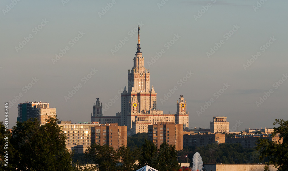 Main Building of Moscow State Univercity in sunset. Residental building on foreground. 