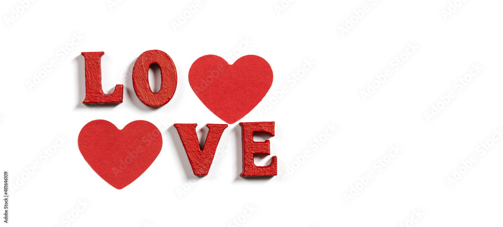 Love inscription with red wooden letters and confetti hearts isolated on awhite background. Valentines Day concept. Copy space, top view, flat lay. Love inscription with red wooden letters and confetti hearts isolated on awhite background. Valentines Day concept. Copy space, top view, flat lay.