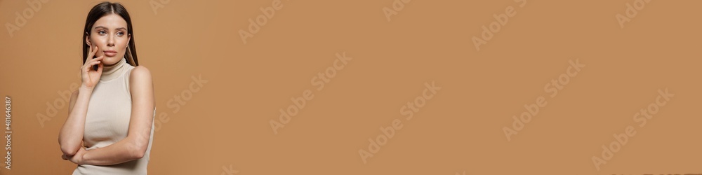 Pretty woman with long straight brown hair posing Pretty woman with long straight brown hair posing