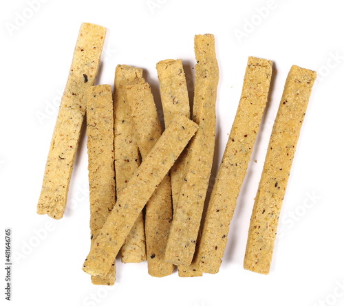 Integral sticks with buckwheat and millet isolated on white  top view