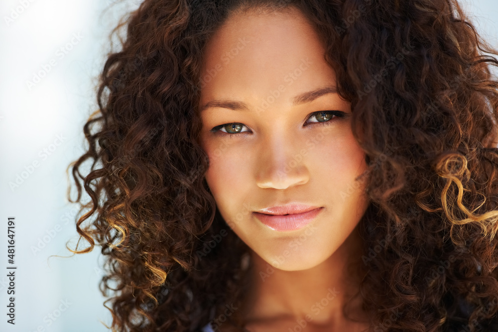 Young beauty with curly hair. Naturally beautiful young woman looking at you. Young beauty with curly hair. Naturally beautiful young woman looking at you.