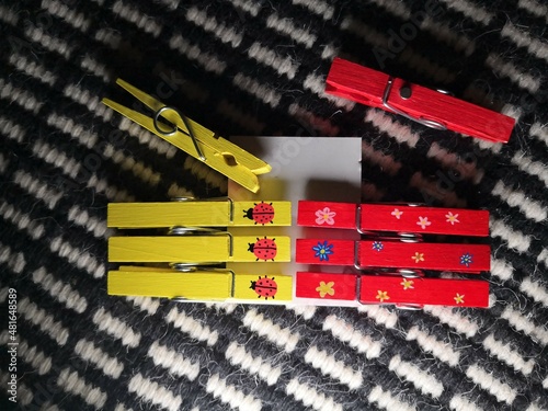 hand painted red and yellow clothespins