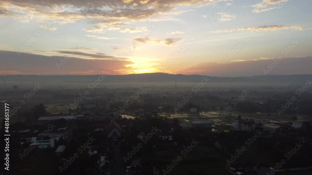 Aerial view video by drone of countryside in Indonesia on sunrise Aerial view video by drone of countryside in Indonesia on sunrise