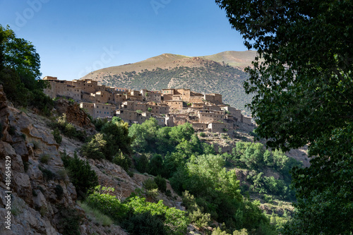 The Atlas Mountains in Morocco. A Berber village clings to the side of the mountain