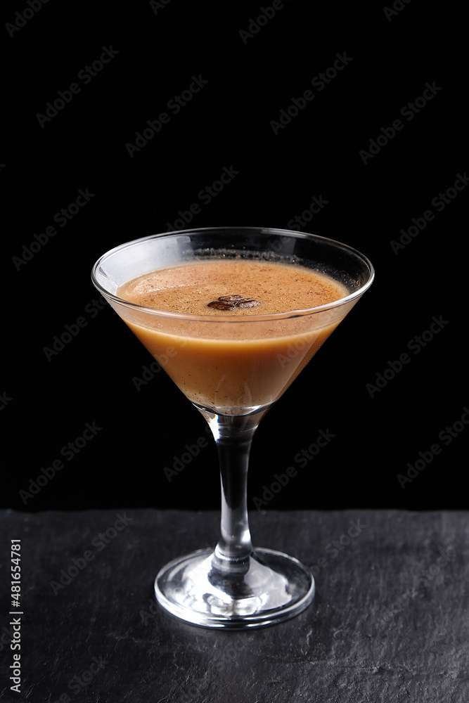 Alcoholic drinks at the bar. Bartender's hands in the process of making drinks. Alcoholic drinks at the bar. Bartender's hands in the process of making drinks.