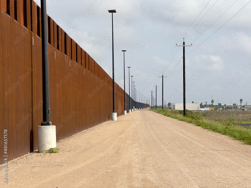 USA-Mexico border in Texas, United States. The newly built border wall.
Walls and security roads.