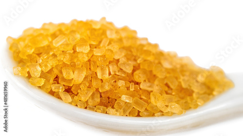 Close-up of brown sugar in white background
