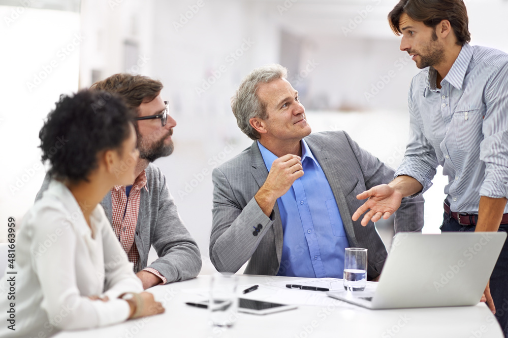 Leading his team through the creative process Leading his team through the creative process
