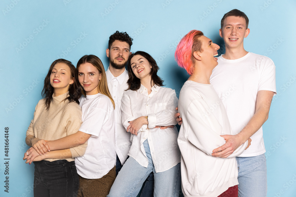 Group of young happy people, men and girls, differents couples standing together. Concept of diversity, relations, emotions, love, marriage Group of young happy people, men and girls, differents couples standing together. Concept of diversity, relations, emotions, love, marriage