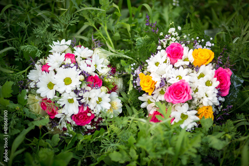 
Bouquet of flowers from roses and daisies, flowers for the day of everything, wedding bouquet, flowers for the bride, wedding accessories.
