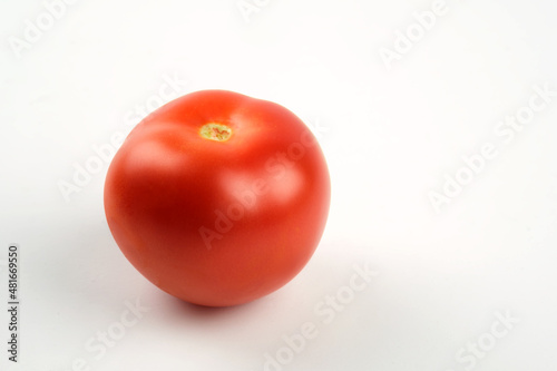 Close up shot of a single tomato