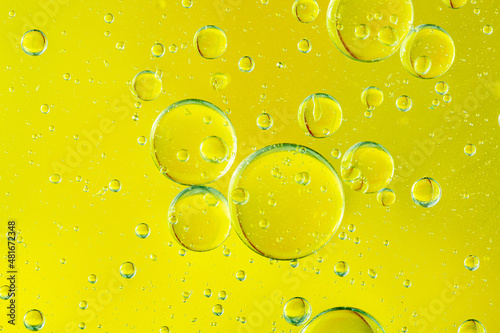 Golden yellow bubble oil,Oil & Water - Abstract Background Green Macro 