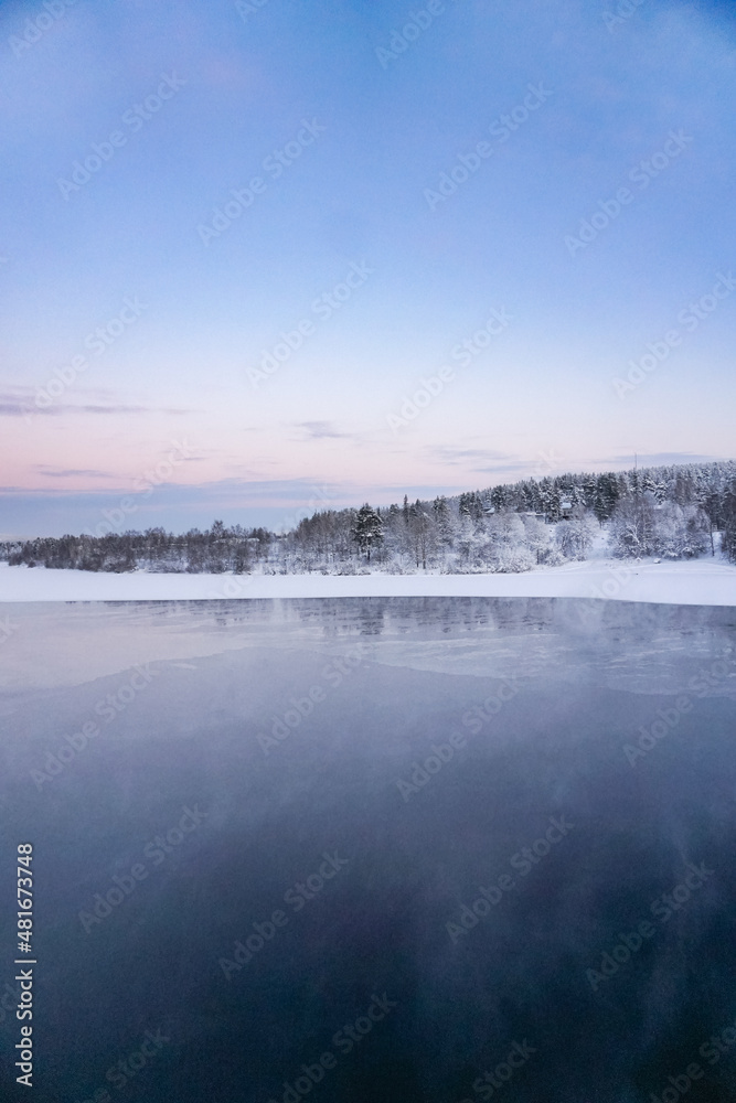 Winter landscape, panorama, banner - view of the frozen river in Lapland
