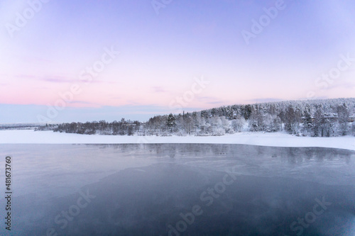 Winter landscape, panorama, banner - view of the frozen river in Lapland © Natalia