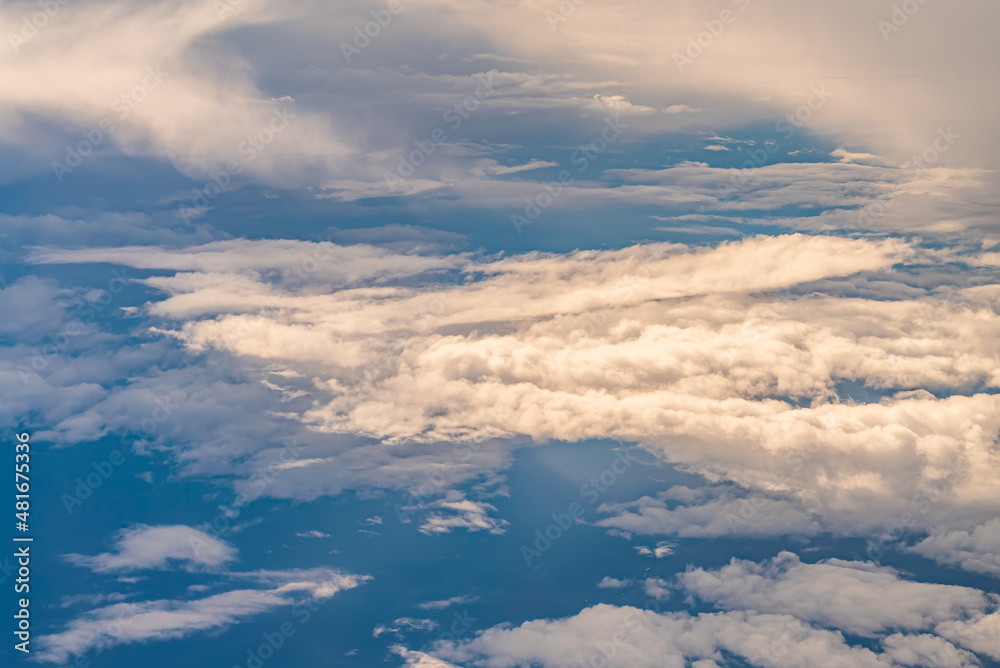 View over the clouds above Tanzania. Bright skyscape View over the clouds above Tanzania. Bright skyscape