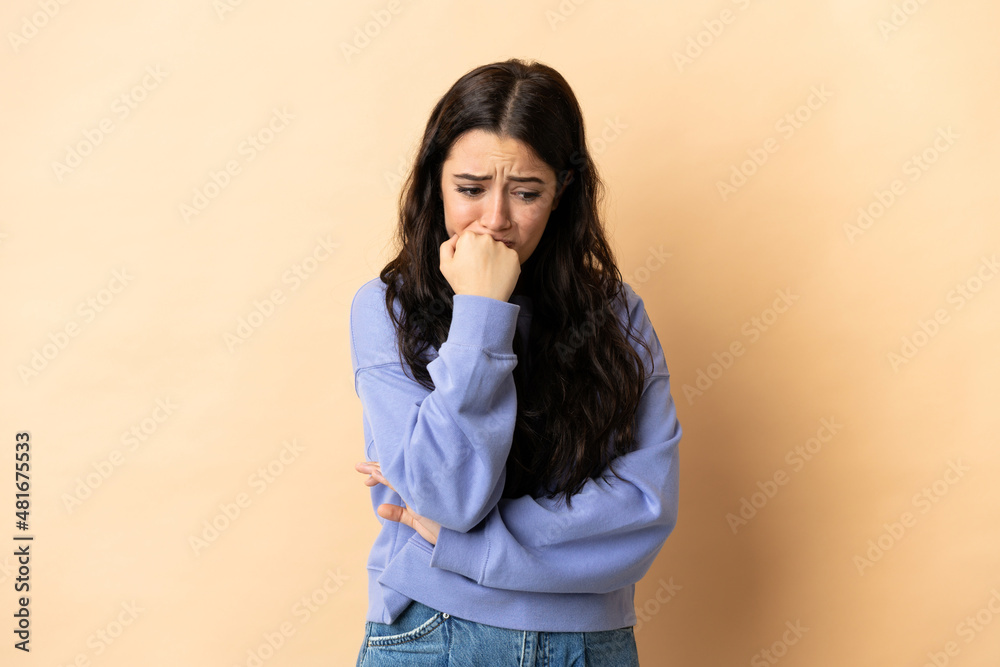 Young caucasian woman over isolated background having doubts Young caucasian woman over isolated background having doubts