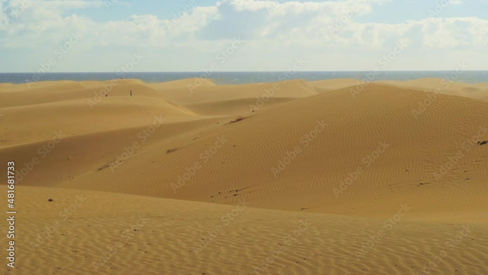 Wind blowing sand on dunes of Maspalomas, Gran Canaria, Spain Wind blowing sand on dunes of Maspalomas, Gran Canaria, Spain