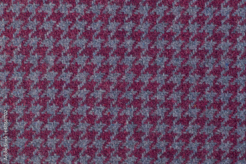 Classic tweed, Wool Background Texture. Coat close-up. Expensive men's suit fabric. Glenurquhart check is made of woolen fabric with a woven twill design of small and large checks. Houndstooth seamles