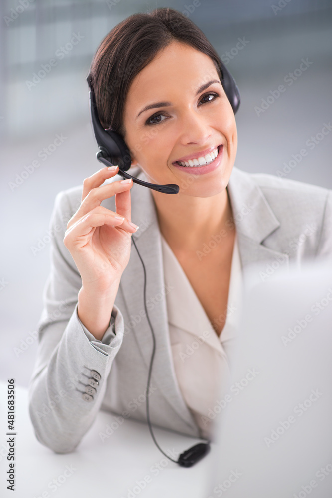 How may I direct your call. Shot of a call center operator sitting infront of her computer. How may I direct your call. Shot of a call center operator sitting infront of her computer.