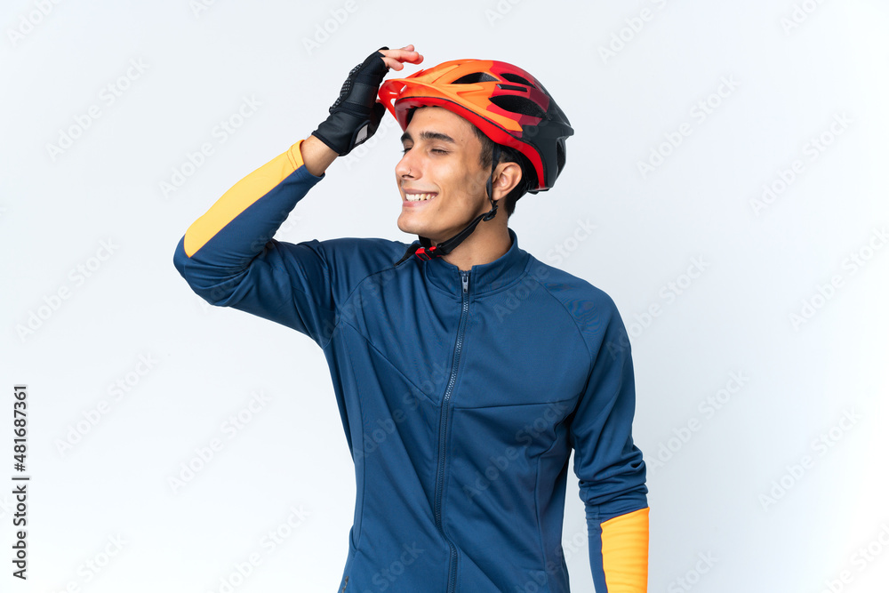 Young cyclist man isolated on background has realized something and intending the solution Young cyclist man isolated on background has realized something and intending the solution