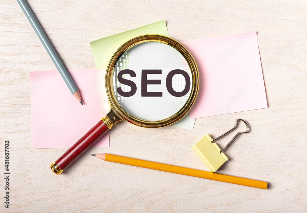 SEO acronym. Search engine optimization concept and magnifier
