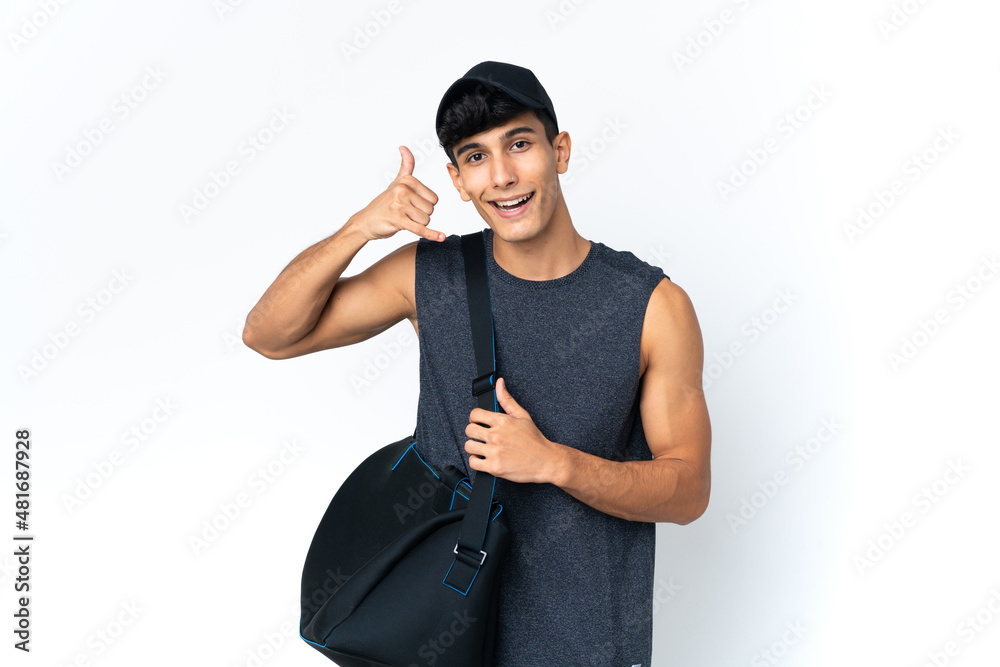 Young sport Argentinian man with sport making phone gesture. Call me back sign Young sport Argentinian man with sport making phone gesture. Call me back sign