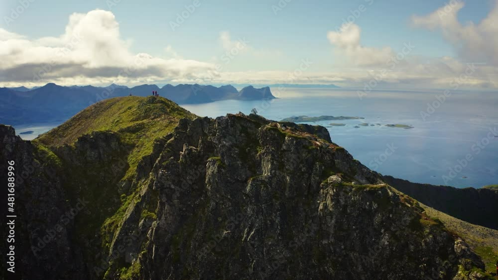 Flying around the Husfjellet Mountain on Senja Island in northern Norway Flying around the Husfjellet Mountain on Senja Island in northern Norway