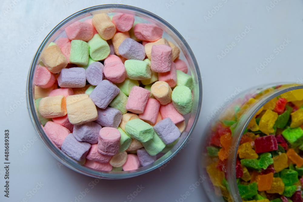 Plate with tasty marshmallows on dark background Plate with tasty marshmallows on dark background