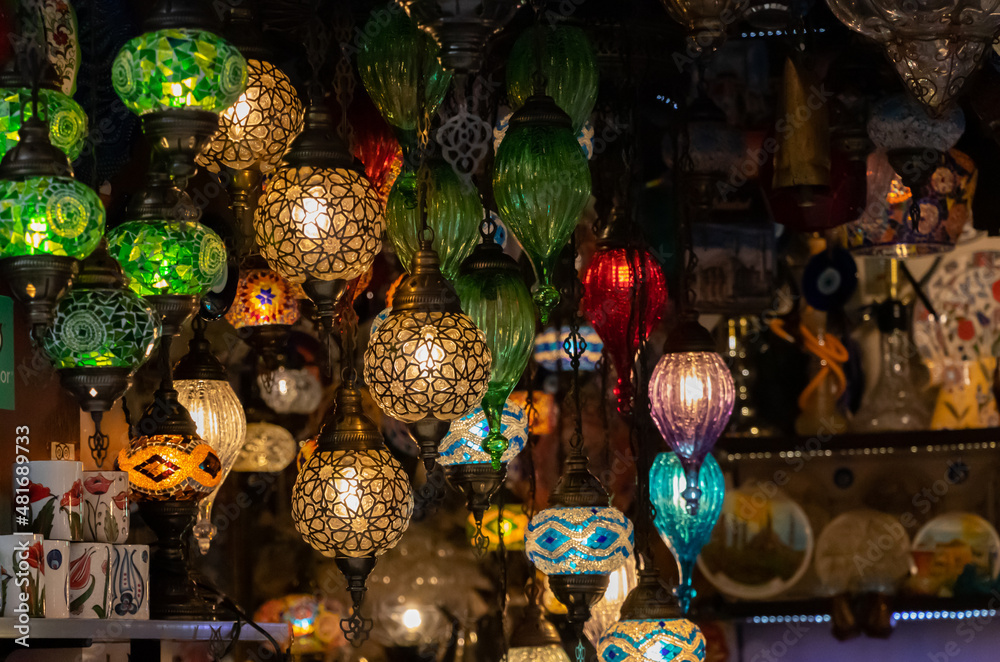 Turkish mosaic hanging lamps. Colorful Oriental lanterns. Vintage multi-colored lamps. Night Bazaar. Ethnicity concept.