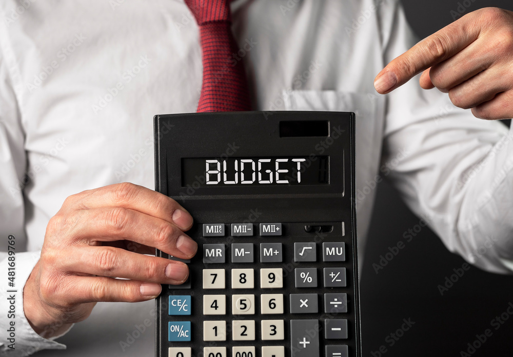 Budget word on calculator. Business financial concept. Budget word on calculator. Business financial concept.