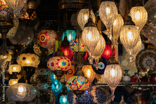 Turkish mosaic hanging lamps. Colorful Oriental lanterns. Vintage multi-colored lamps. Night Bazaar. Ethnicity concept. © burhan