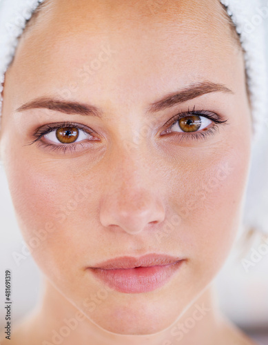Serious about her skincare routine. Head shot of a gorgeous woman with a flawless complexion.