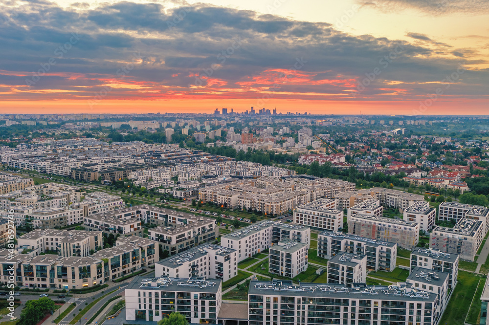 Warsaw Wilanow district and distant city center aerial view. Large housing project in prestige area.