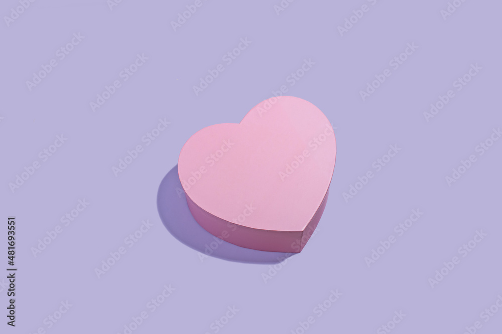 pink gift box on a lilac background pink gift box on a lilac background